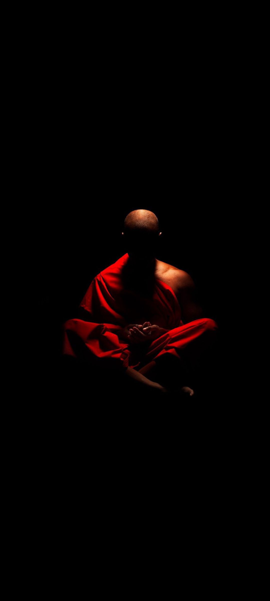 Meditating Monk in Red - spiritual wallpaper for Darkify
