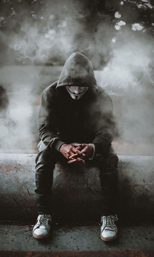 Anonymous Figure in Smoke