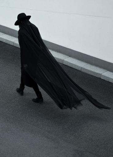 Dark Figure in Motion - gothic Wallpaper