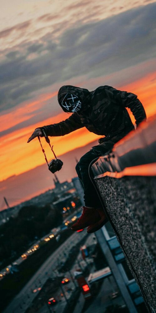 Masked Figure City Sunset - mask Wallpaper