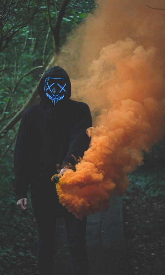 Masked Figure Smoke Bomb