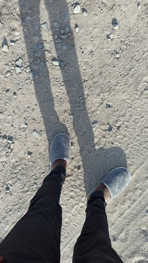 Slippers on Sandy Ground - Related StockWalls wallpaper
