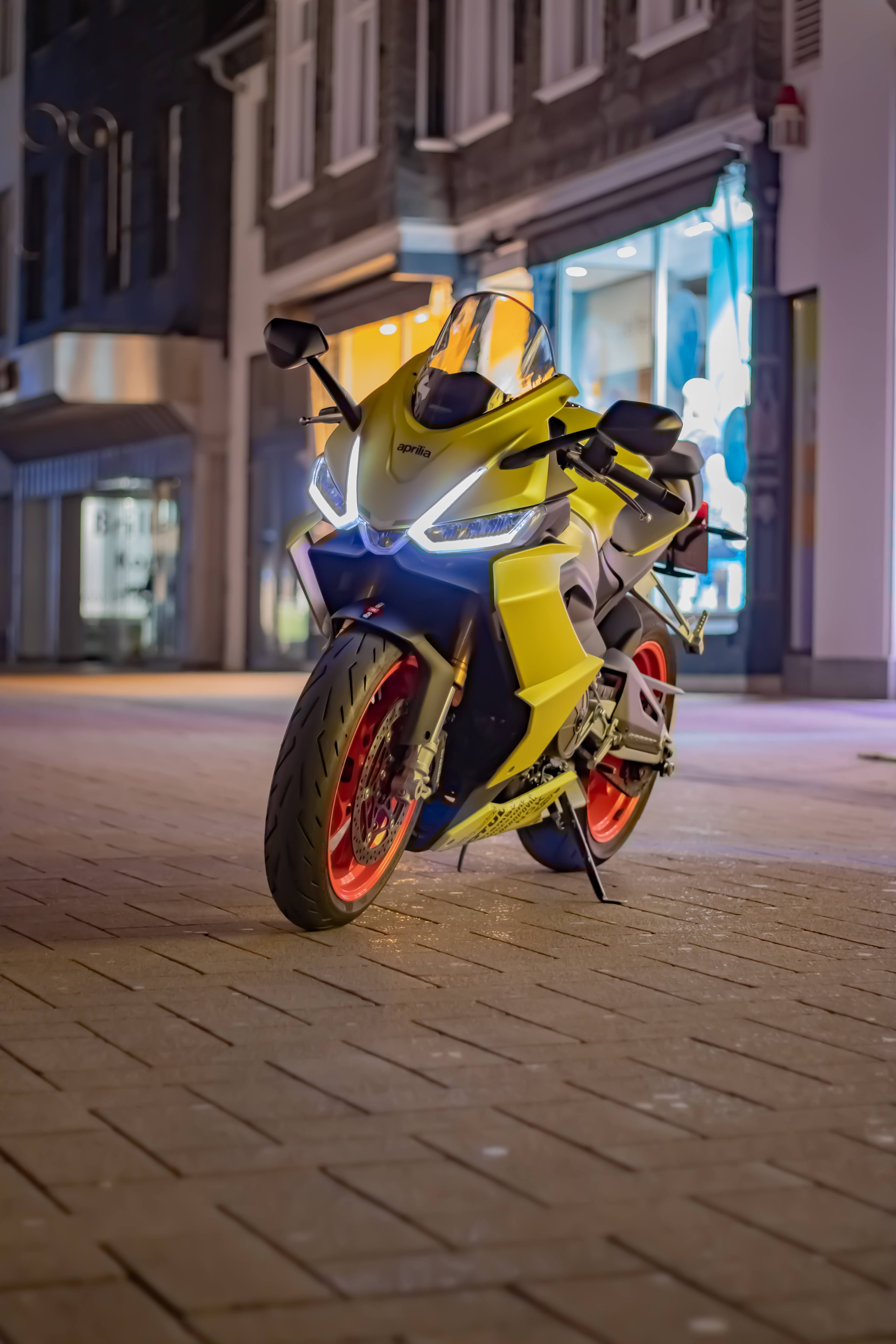 Yellow Aprilia at Night - motorcycle wallpaper for OpersCraft