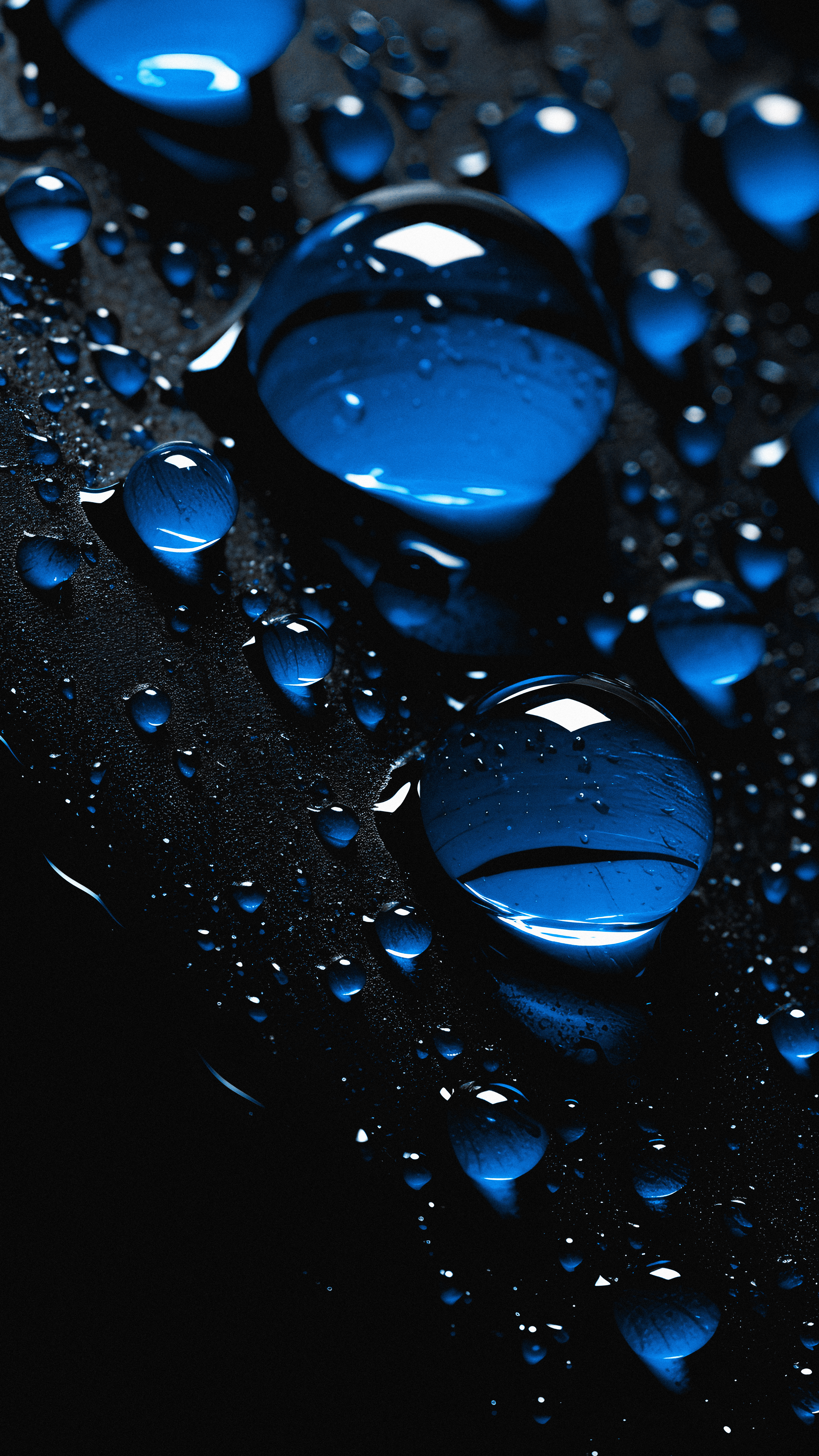 Glowing Blue Raindrops - macro wallpaper for StockWalls