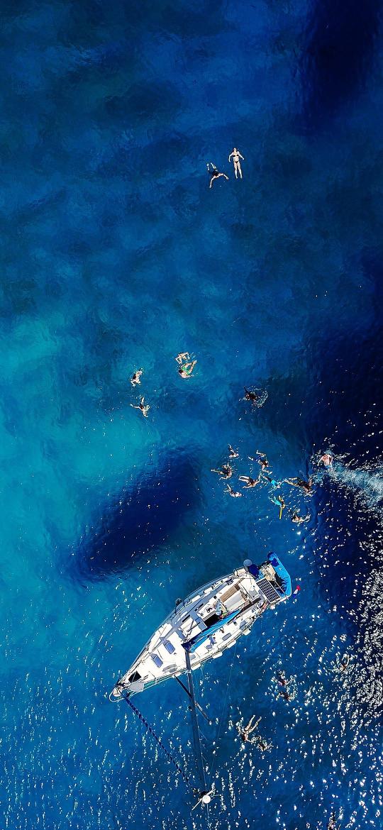 Sailboat and Swimmers - Related StockWalls wallpaper